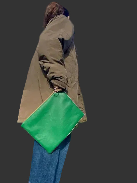 Double faced green/ cartoon print clutch bag