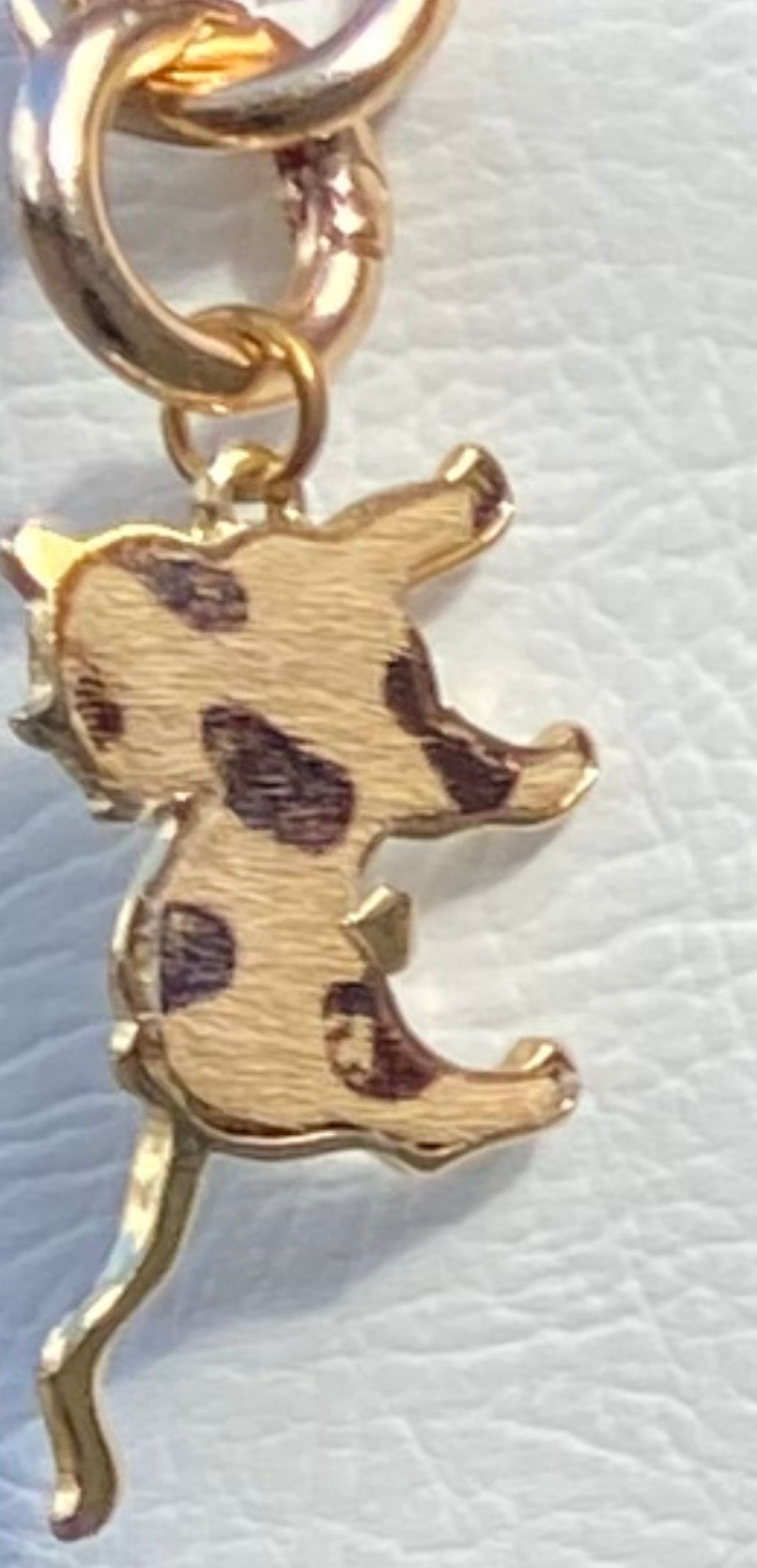 Gold animal print charm