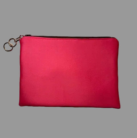 Brown and pink scuba clutch bag with 'Recycle' text