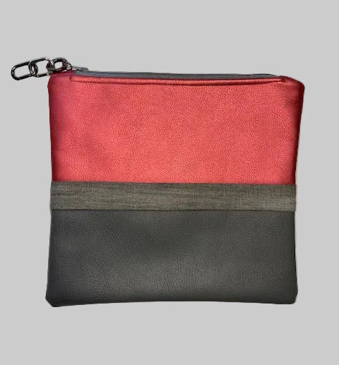 Grey faux leather, denim and metallic pink clutch bag